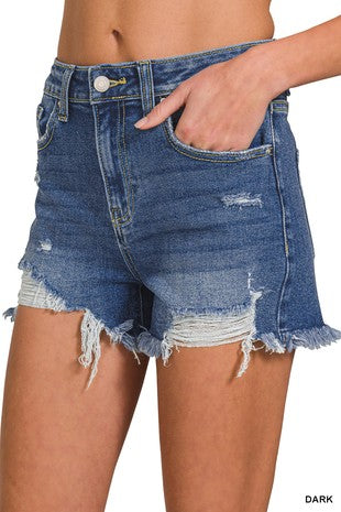Dark wash distressed hem shorts