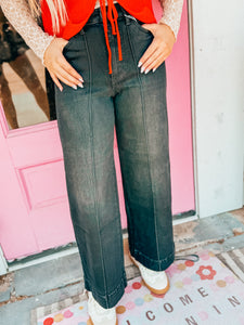 Black stretch high rise pin tuck wide leg jeans