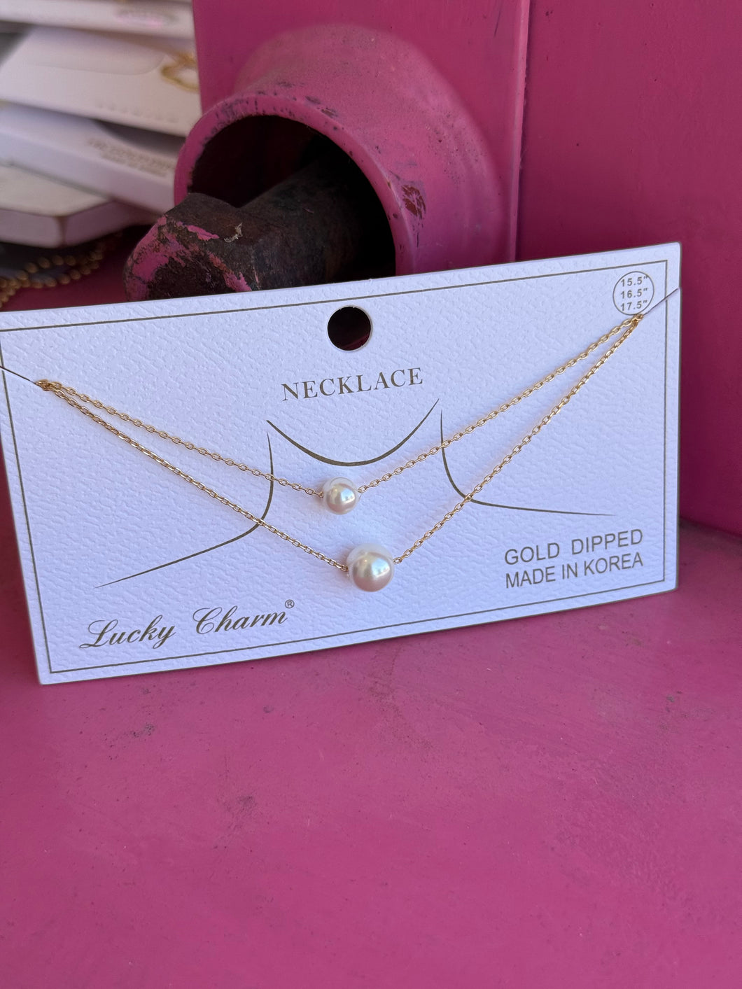 Gold pearl necklace