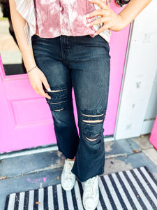 Mid rise black distressed straight leg jeans