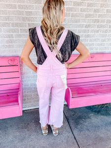 Pink distressed crop overalls