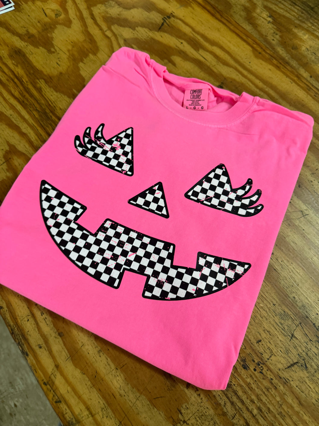 Neon Pink Jack-O'-Lantern checkered tee