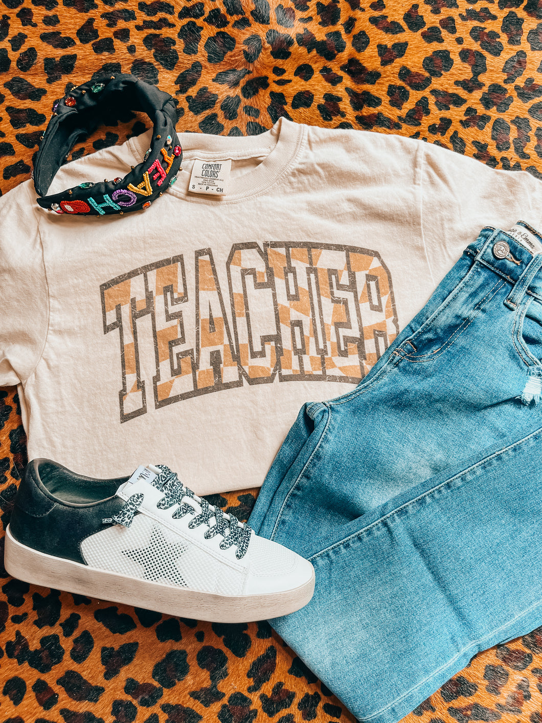 Ivory Teacher checkered varsity tee