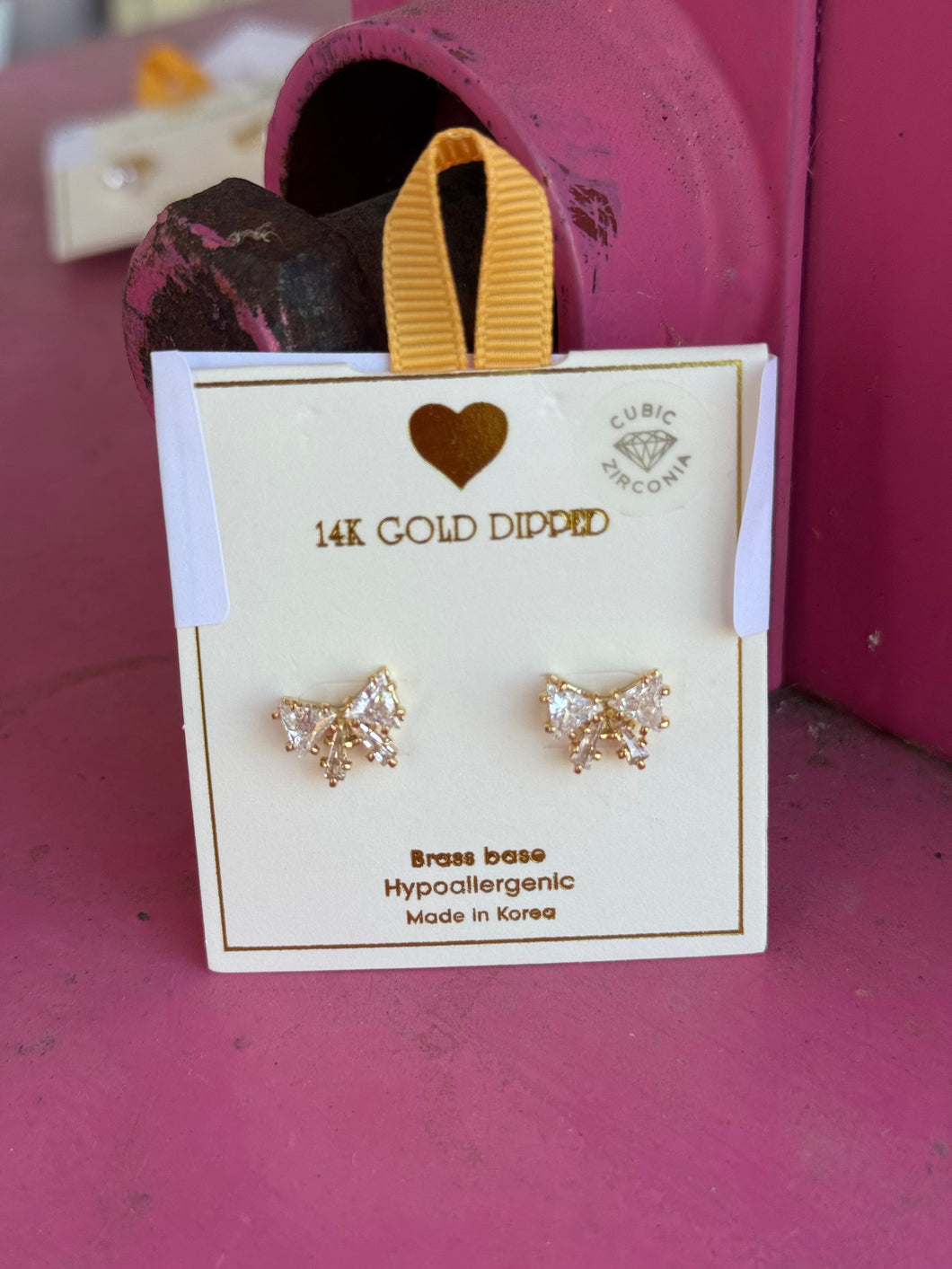 Gold chunky rhinestone bow studs