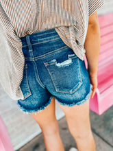 Load image into Gallery viewer, Risen Mid rise dark wash distressed shorts
