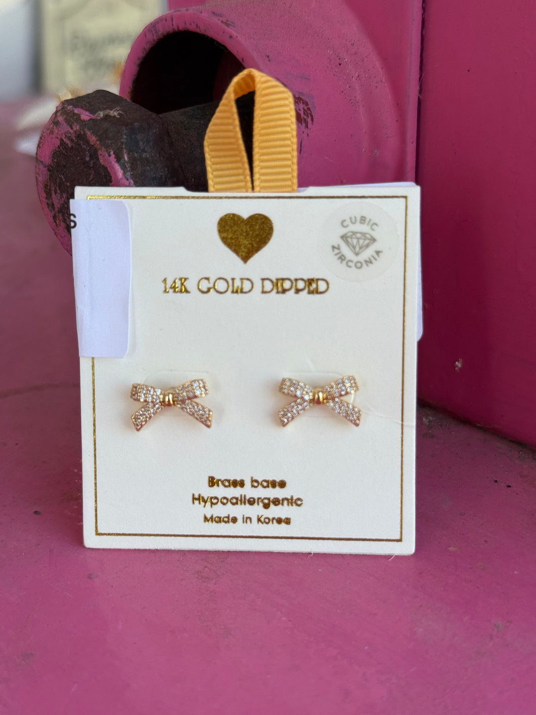 Gold rhinestone bow studs