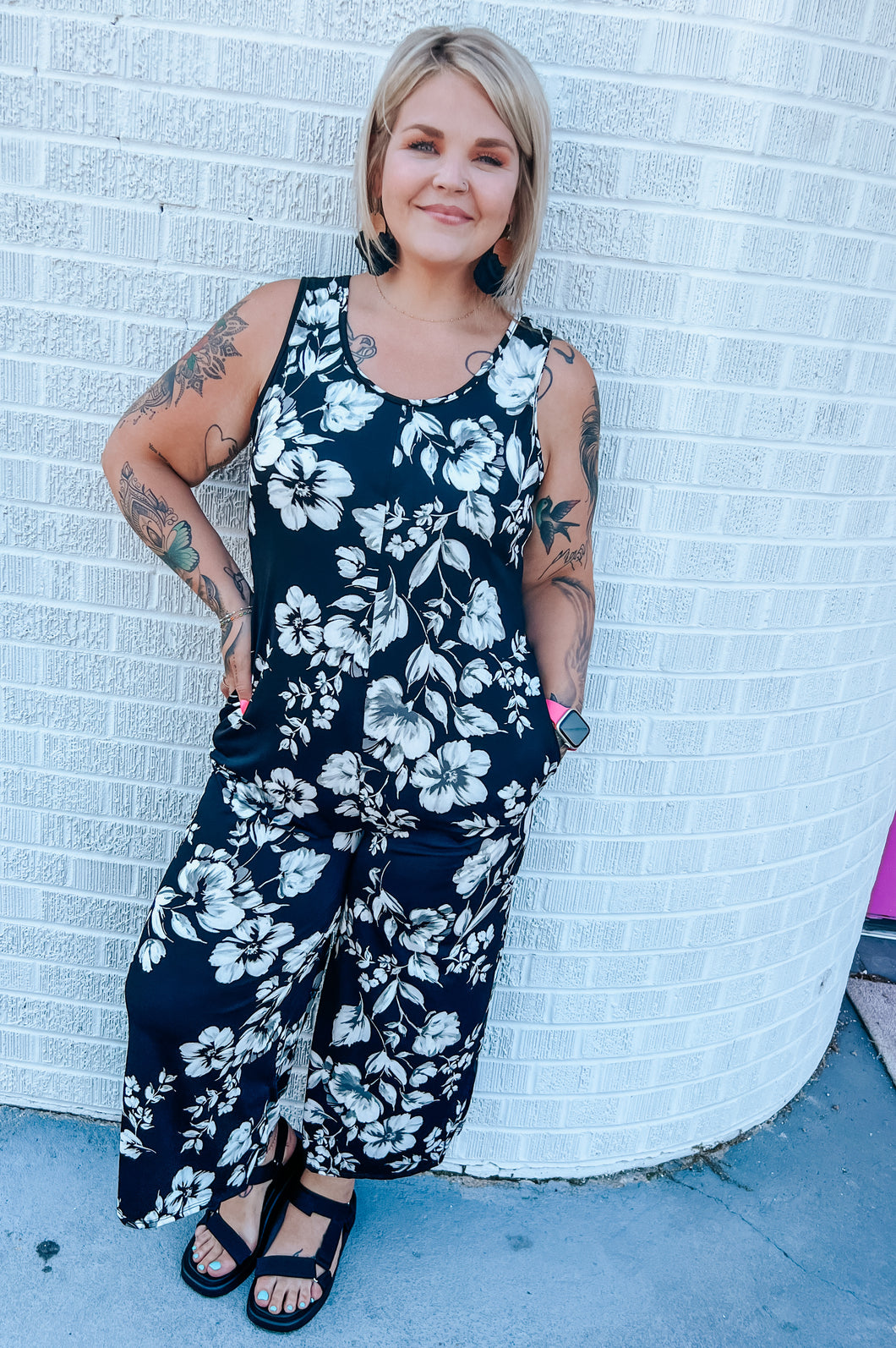 Black floral acting pro Romper, XL