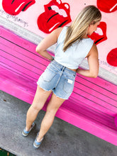 Load image into Gallery viewer, Light wash High rise distressed shorts

